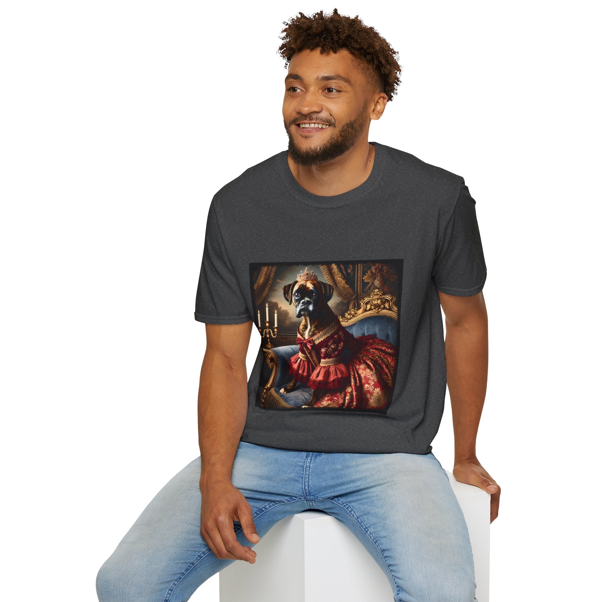 Male model in dark heather dog t-shirt featuring boxer in ornate red gown and tiara seated on royal blue armchair.