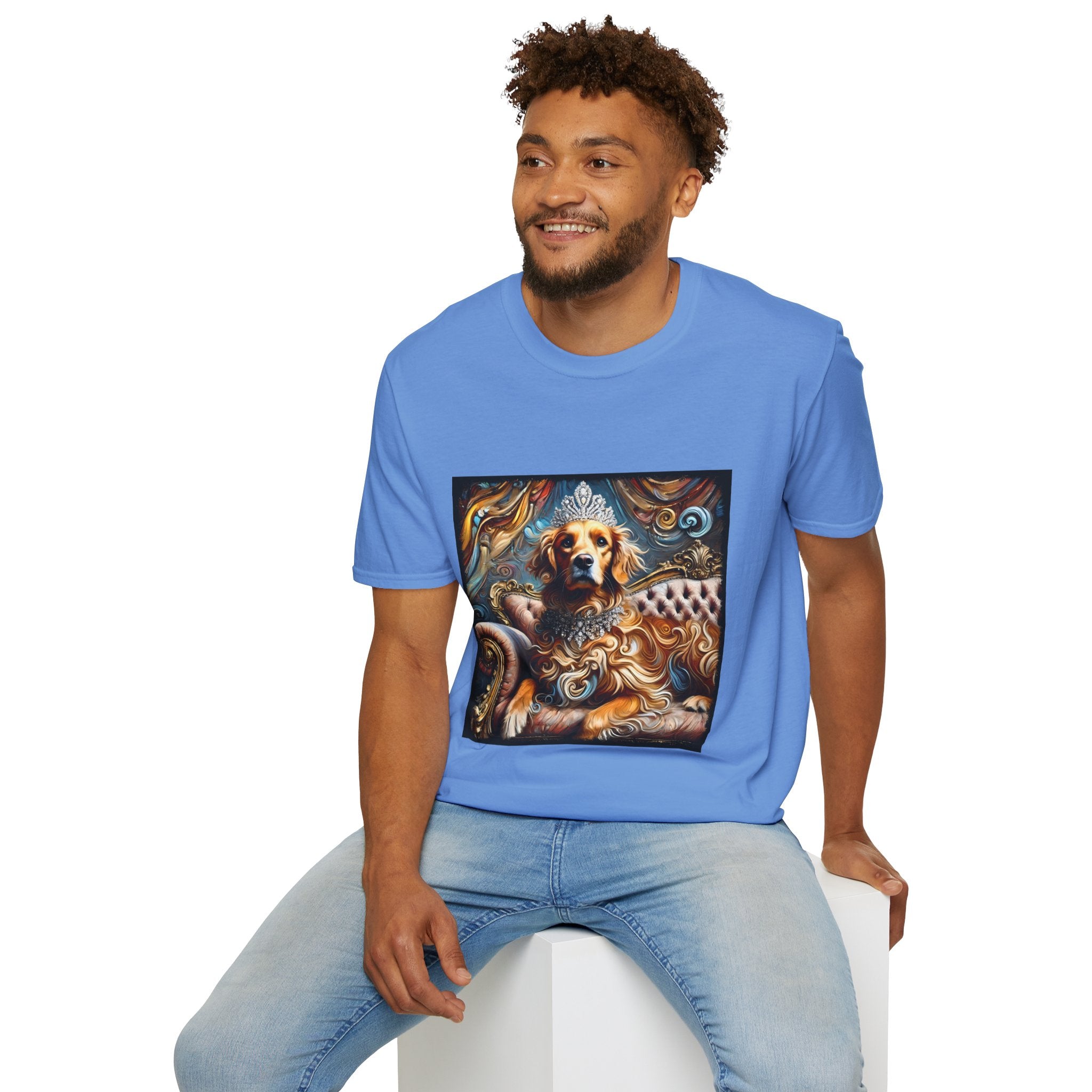 Male model in Carolina blue dog t-shirt with golden retriever in crown and jewels on tufted settee, baroque-style backdrop.