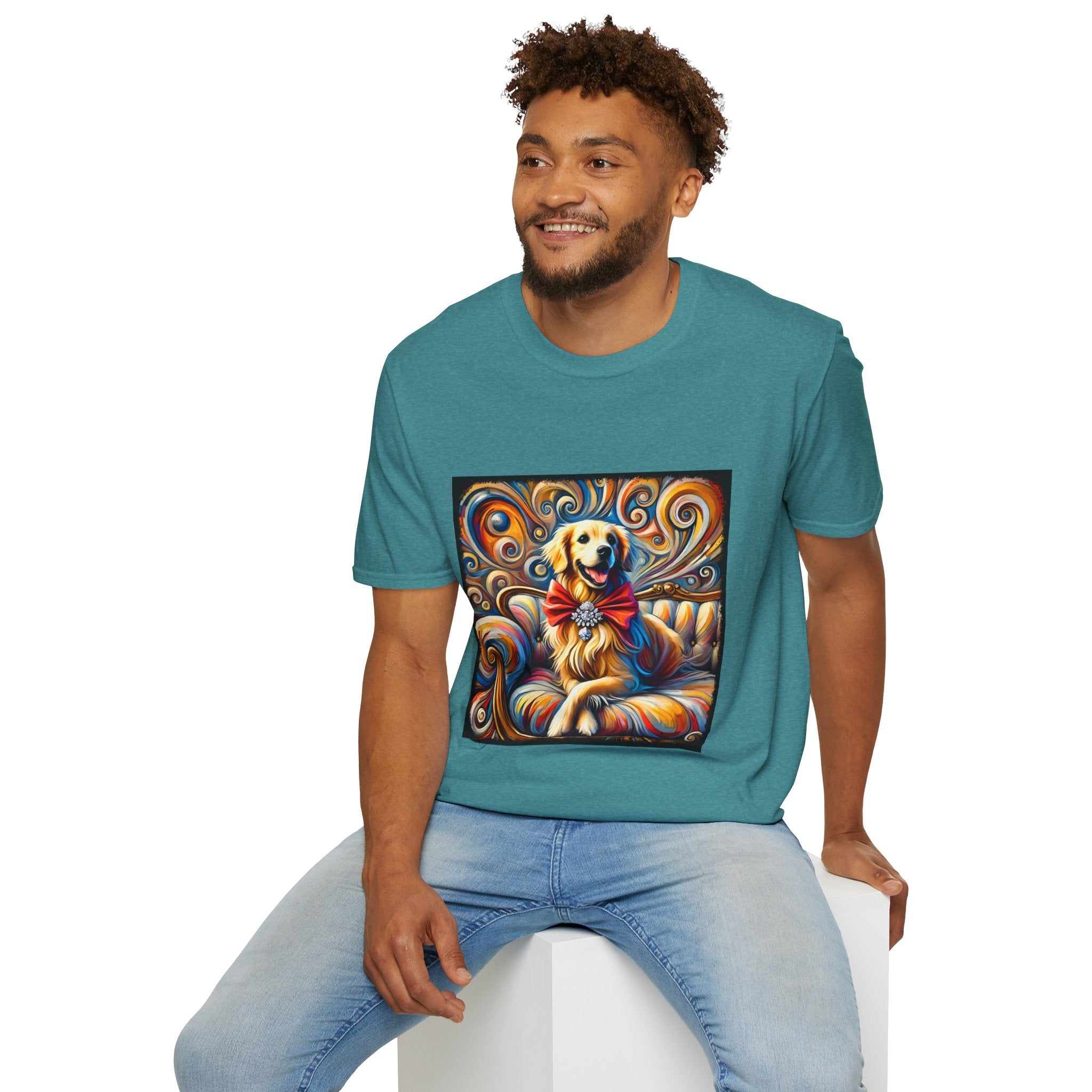 Male model in teal dog t-shirt featuring golden retriever with red bow on colorful swirl settee background.
