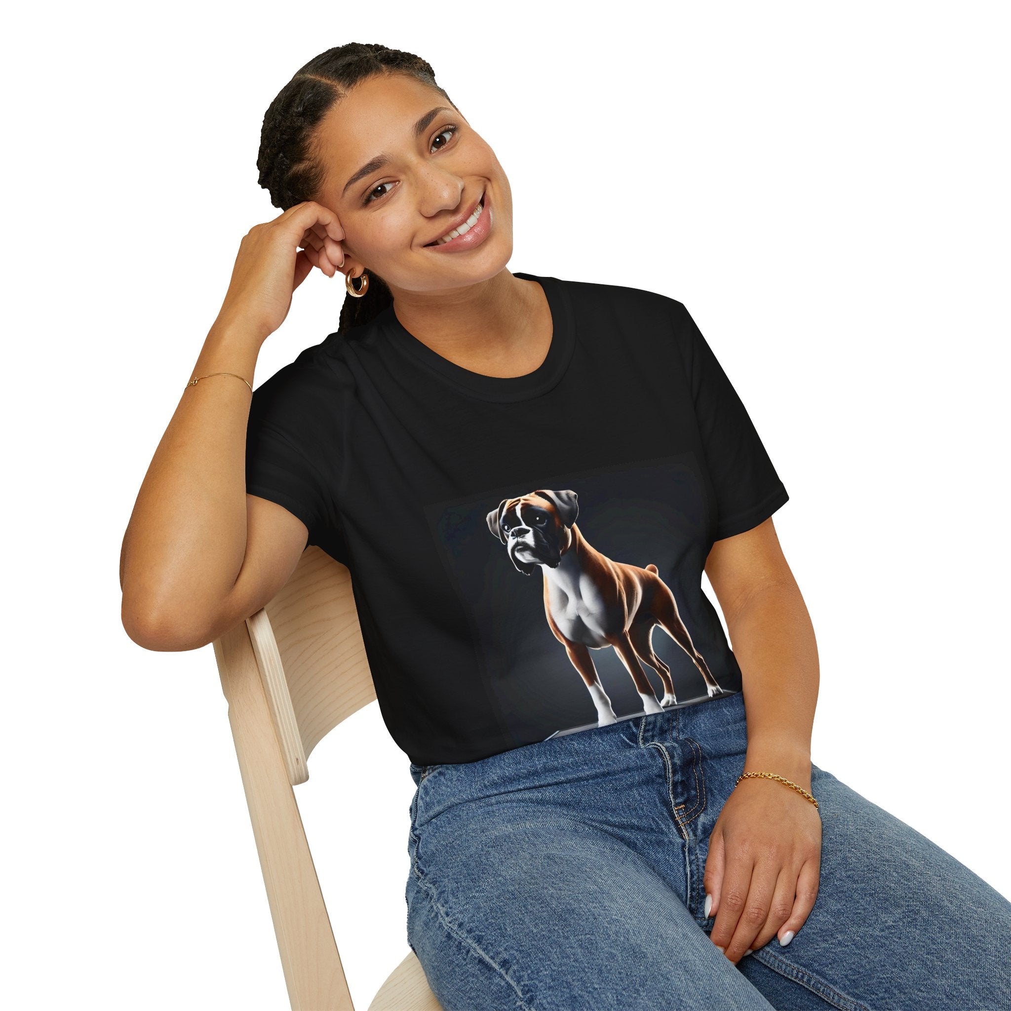 Female model in black dog t-shirt featuring standing boxer on platform with black background and dramatic lighting.