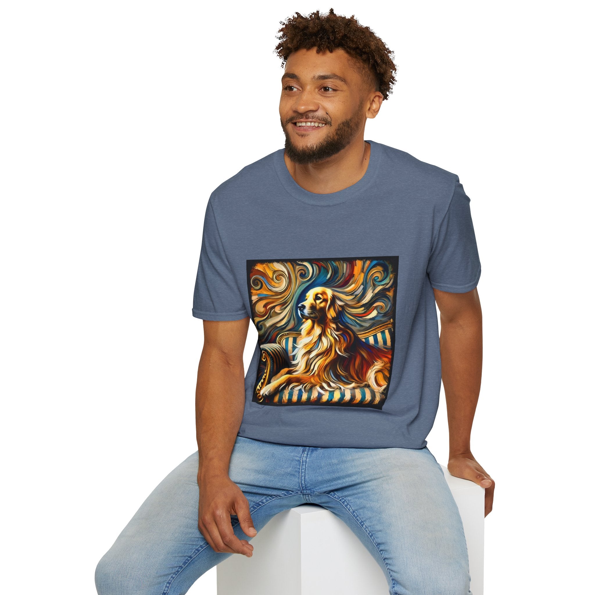 Male model in heather indigo dog t-shirt featuring golden retriever on striped settee with swirling abstract background in golds.