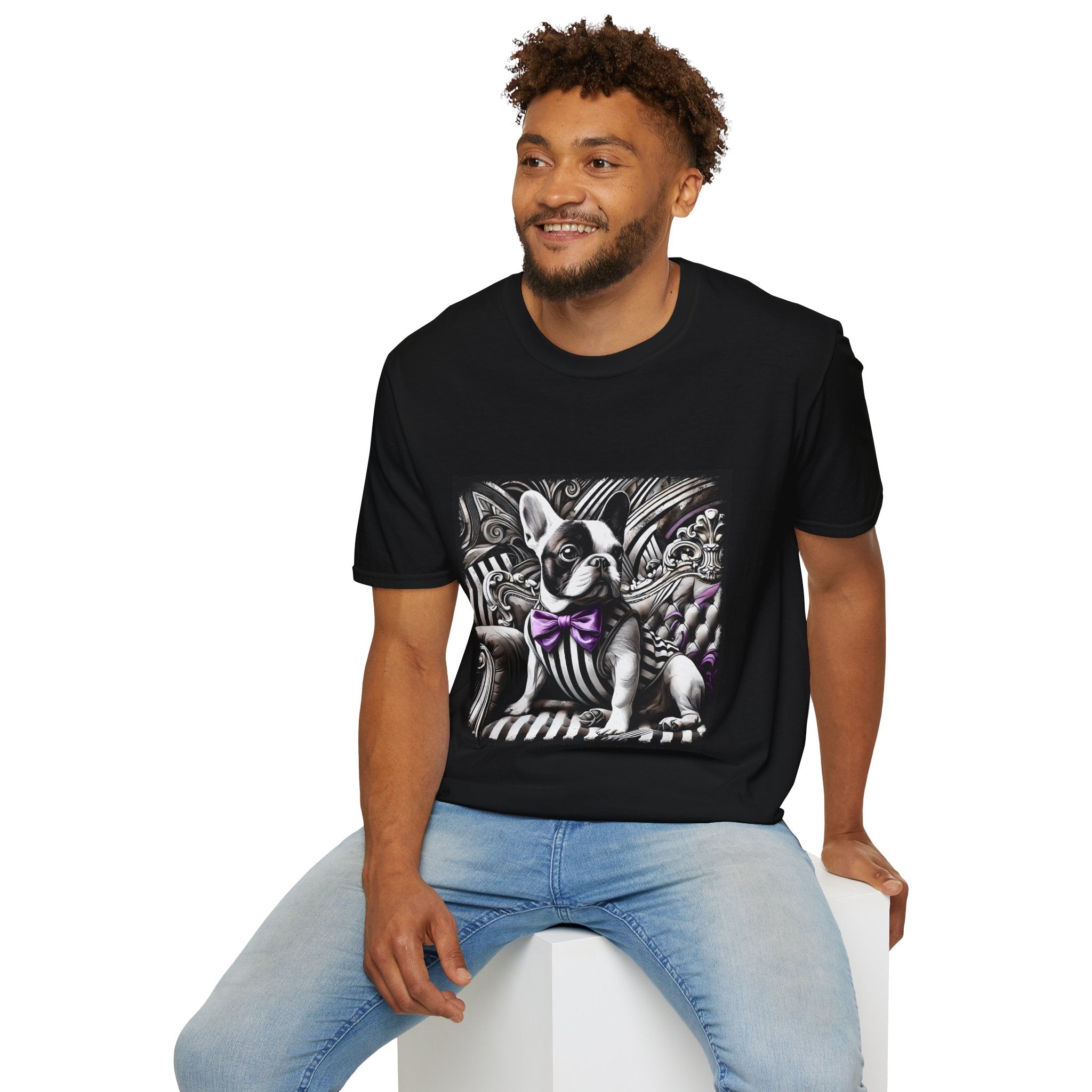 Male model in black dog t-shirt with French Bulldog in striped suit, purple bowtie, and ornate black swirl backdrop.