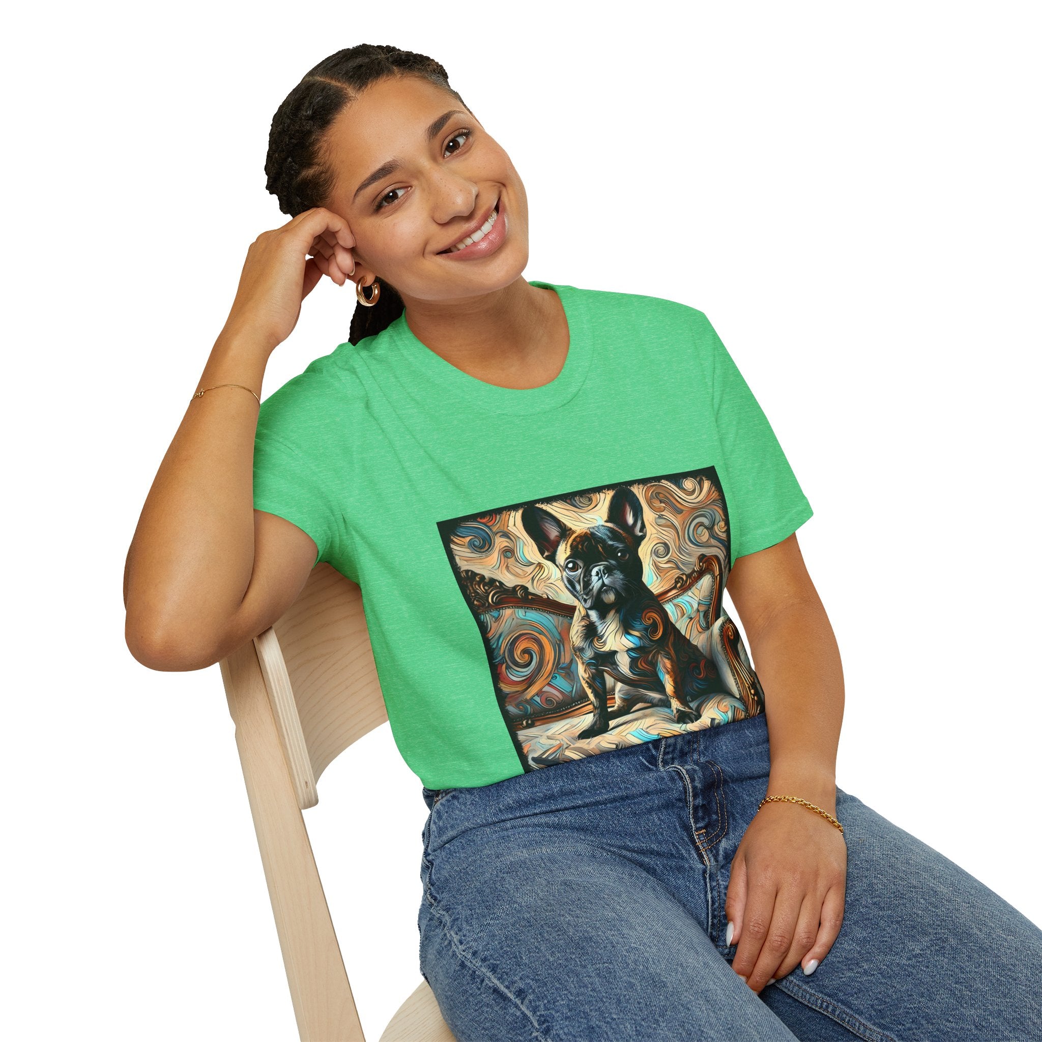 Woman sitting in Irish green dog t-shirt with black and tan French Bulldog on ornate settee and swirling patterned background.