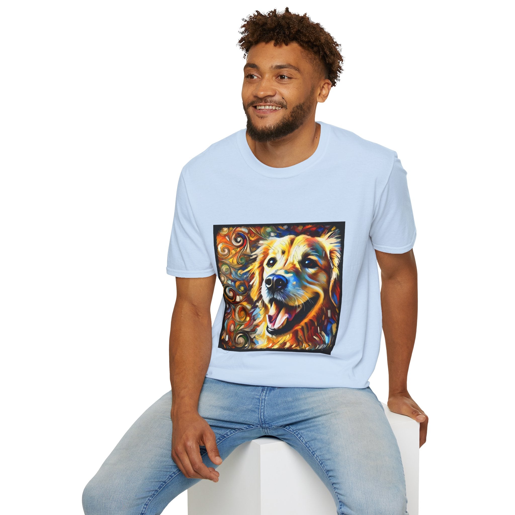 Male model in light blue dog t-shirt featuring smiling golden retriever portrait with bold swirls in orange, gold, and blue.