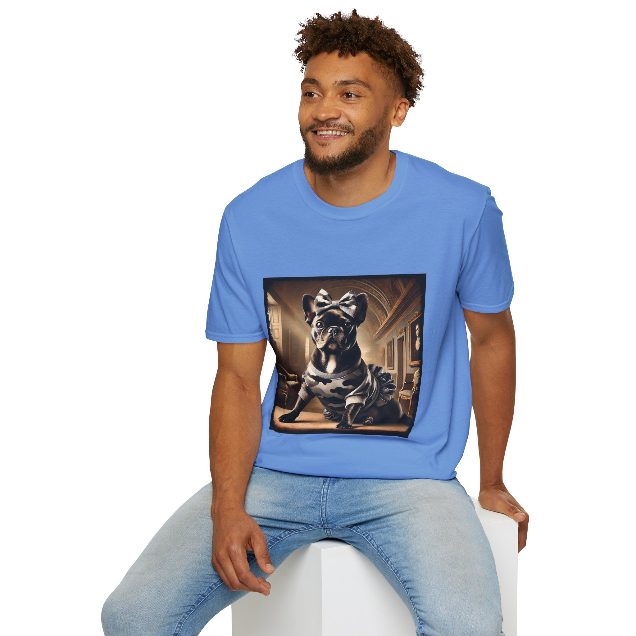 Male model in Carolina blue dog t-shirt featuring black French Bulldog in camo dress and bow, set in sepia-toned palace hall.