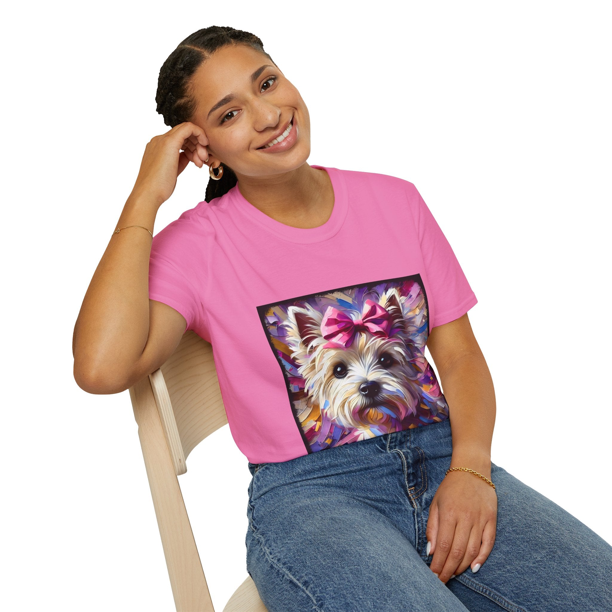 Female model in pink dog t-shirt with Westie face, pink bow, and bold brushstroke colors in purple, pink, and gold.