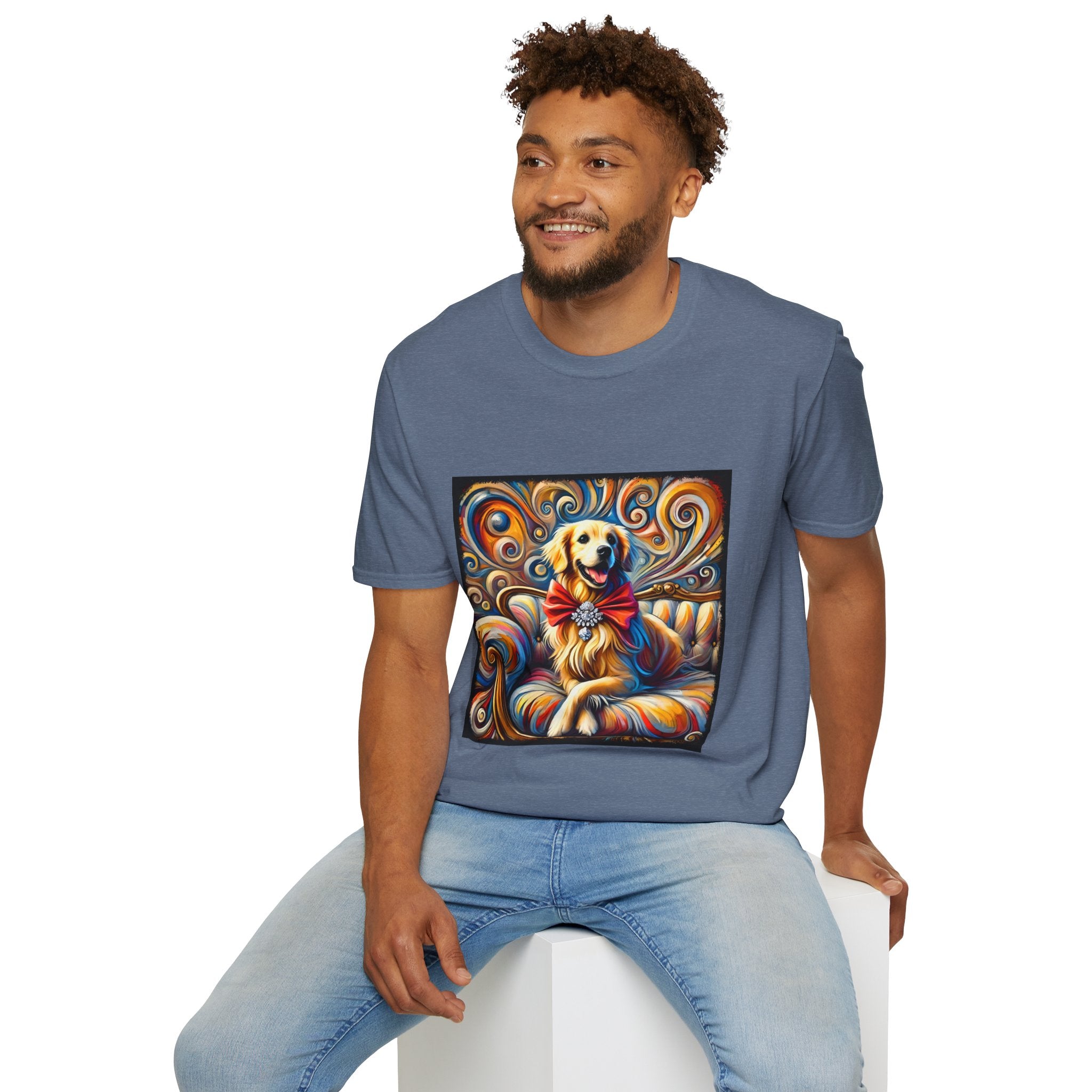 Male model in heather indigo dog t-shirt featuring golden retriever with red bow on colorful swirl settee background.
