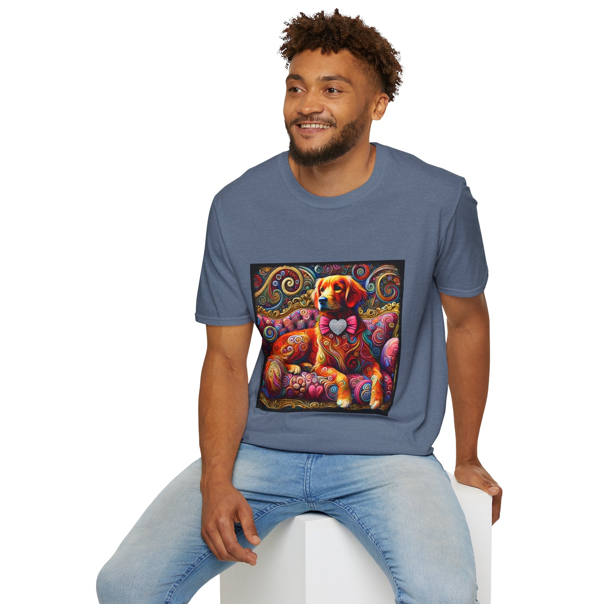 Male model in heather indigo dog t-shirt with golden retriever in pink bow on vibrant swirl settee with heart details.