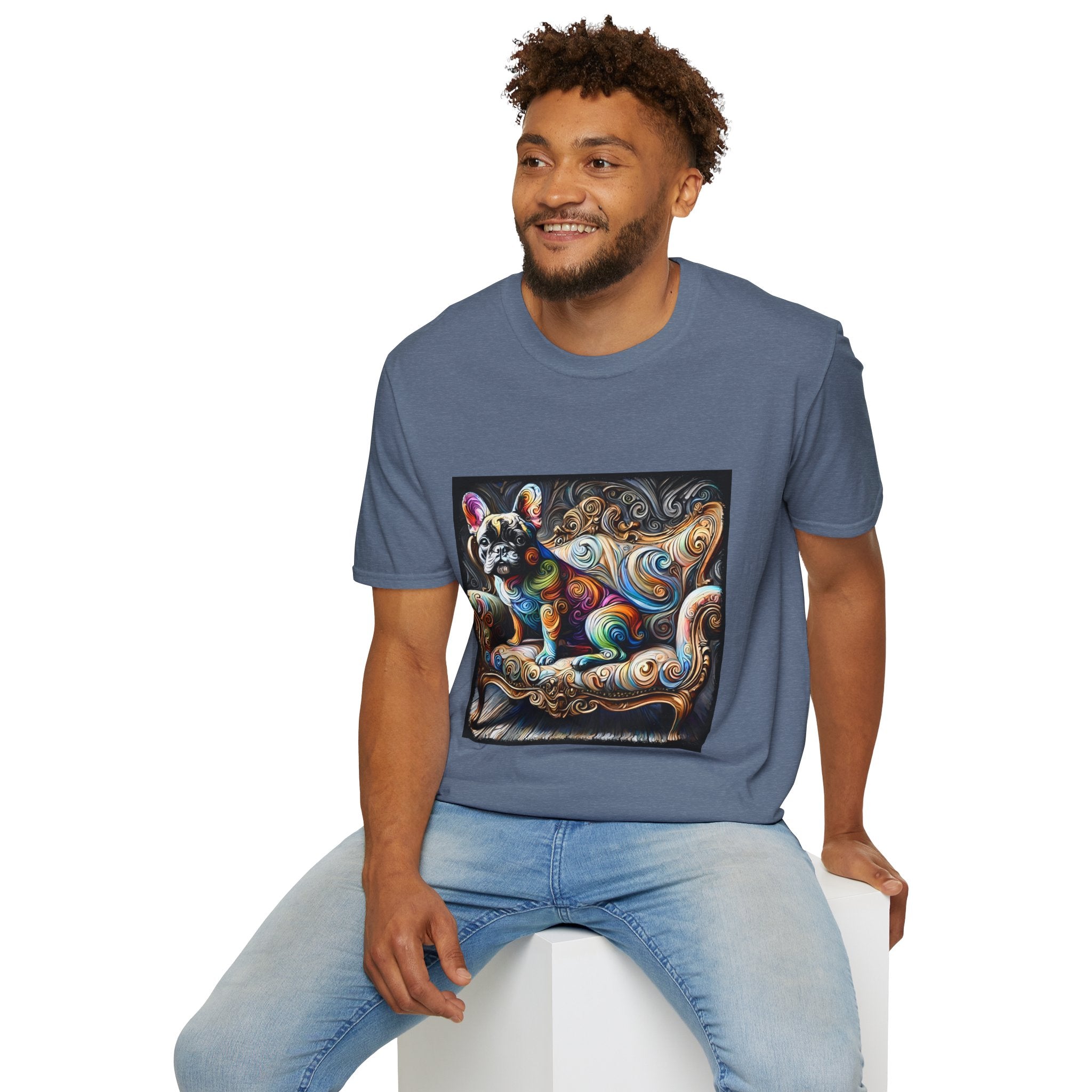 Male model in heather indigo t-shirt featuring rainbow French Bulldog on golden settee with swirl pattern, expressionism style.